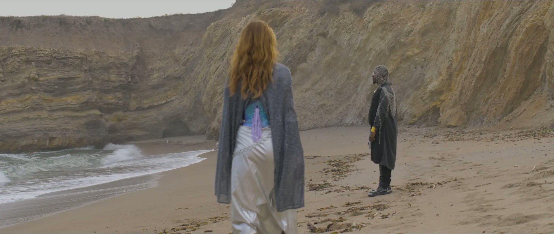 STARS music video first look still 2 — First contact at the threshold — Whooz Whoo and the honor guard before the NOT AN EXIT door.
